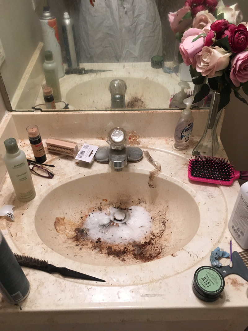 Hoarder sink that is dirty from years of grime